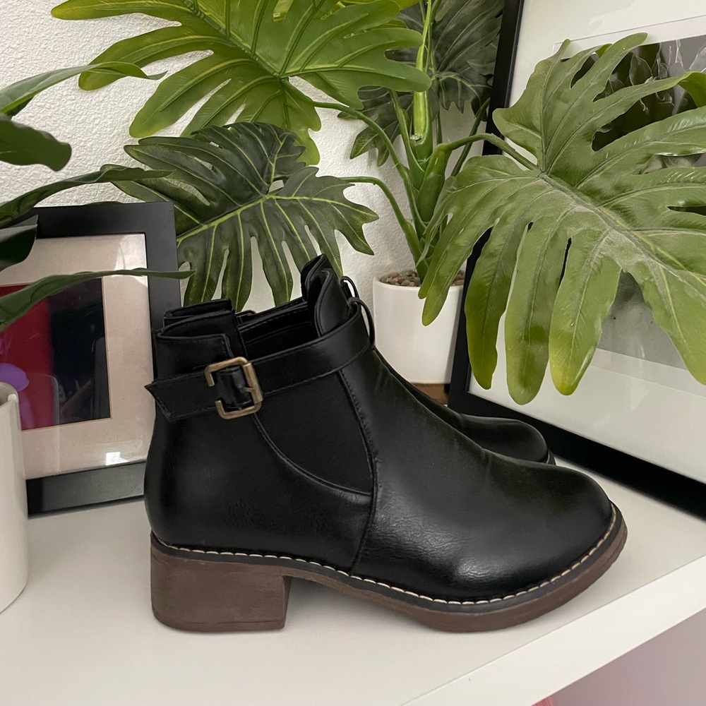 Black Ankle booties with buckle.